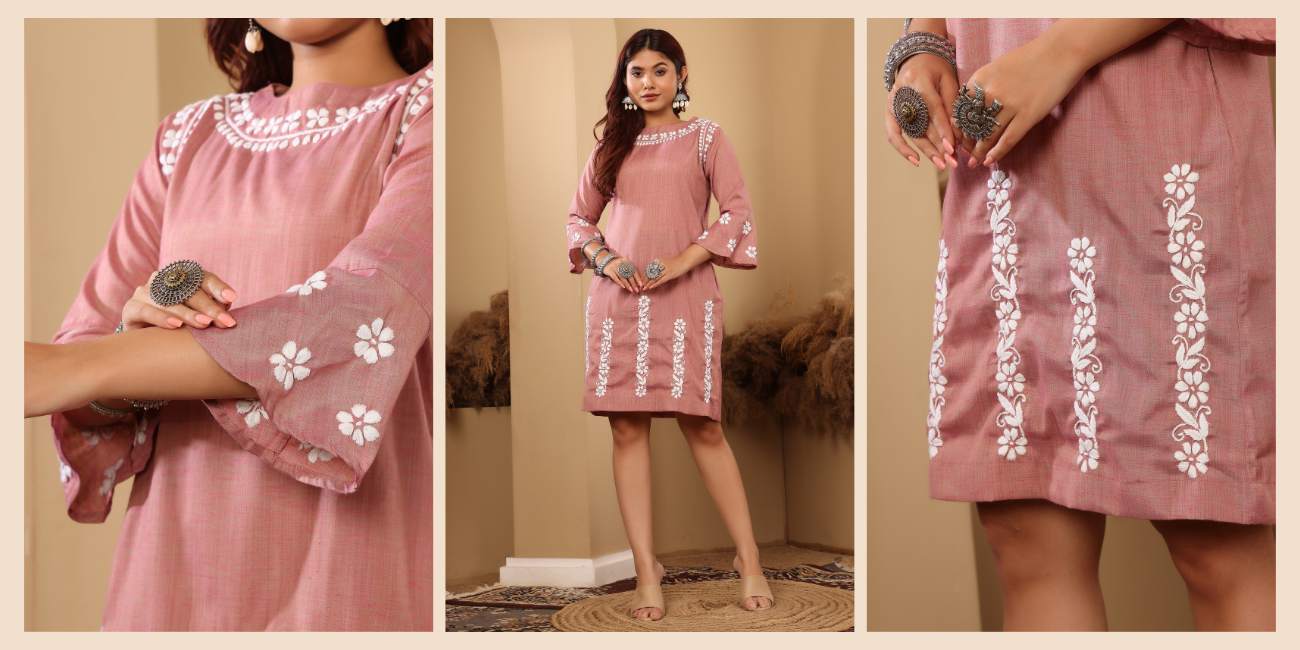 A woman wearing a chikankari white on pink short dress