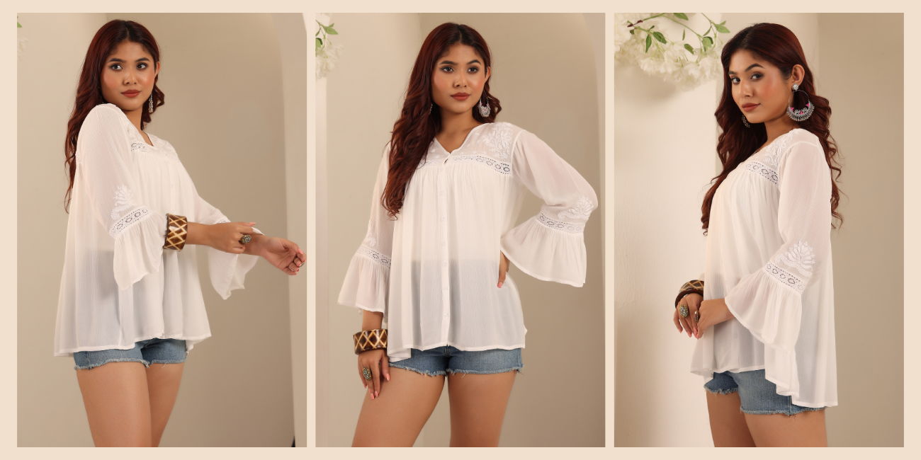 woman showcasing a white chikankari top with jean shorts